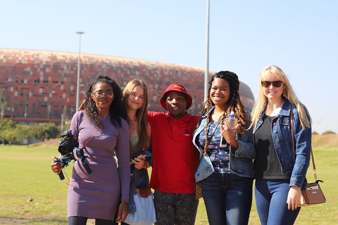 1 Day: Bus & Soweto Combo - Entering Soweto through its major landmarks