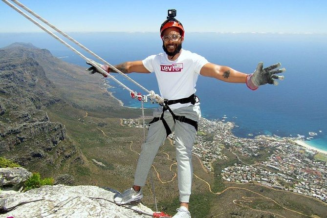Abseiling Table Mountain - Stepping over the cliff edge