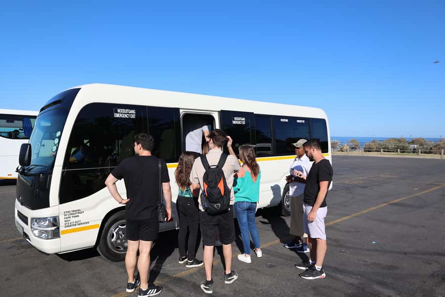 Cape Peninsula & Penguins Beach Half Day Tour from Cape Town - Muizenberg adds a colorful final glance