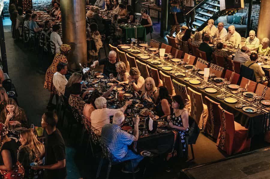 Cape Town: African Dinner, Drumming Experience with Transfer - The restaurant setting and service