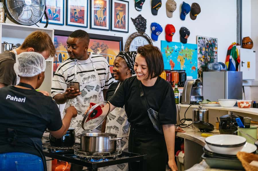 Cape Town: Authentic African Cuisine Cooking Experience - African drinks and starter snacks begin the experience