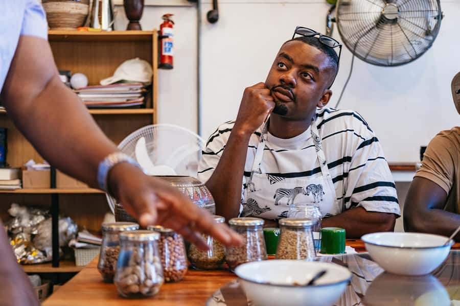Cape Town: Authentic African Cuisine Cooking Experience - Stews, greens and chakalaka fill the table