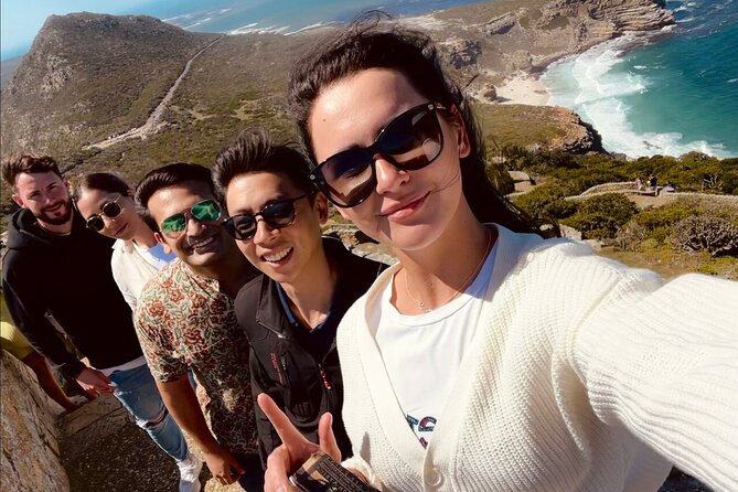 Cape Town Peninsula and Penguins Private Sightseeing Tour - Camps Bay and the Maiden’s Cove photo stop