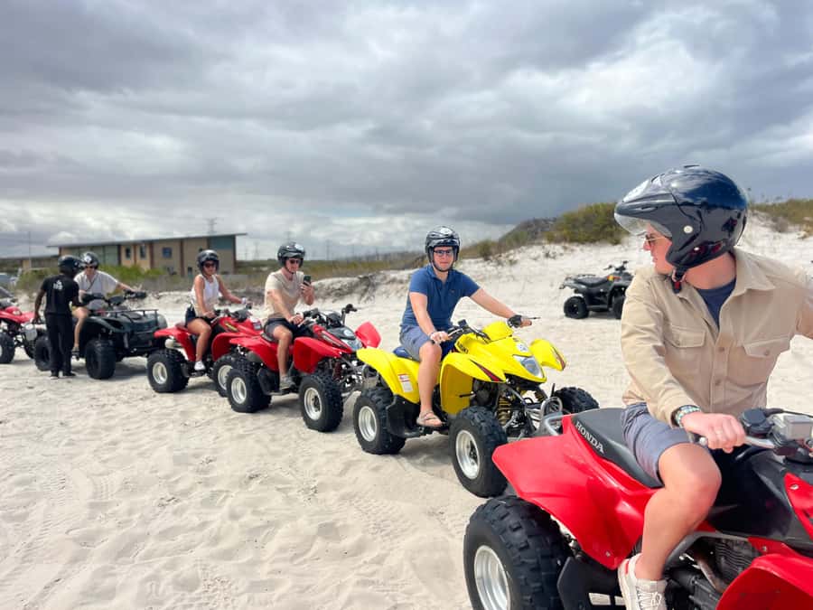 Cape Town: Sand Dunes ATV Quad Bike Tour - White dunes, uneven hills, and Table Mountain views
