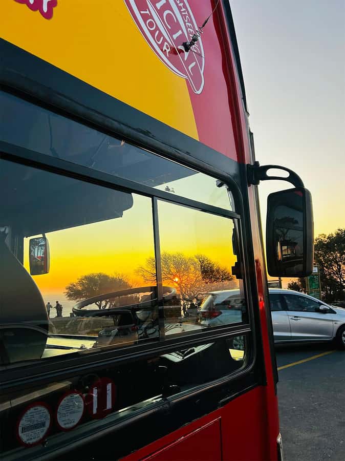 Cape Town: Sunset Bus Tour with Picnic on Signal Hill - Practical packing advice for a comfortable evening