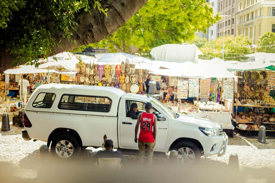 Cape Town Walking Tour: Bo-Kaap & City Highlights - Greenmarket Square, crafts, and a practical break