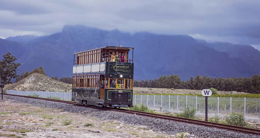 Cape Town: Wine Tram & Winelands Tour with Tastings & Pickup - From Cape Town to Stellenbosch through Helshoogte Pass