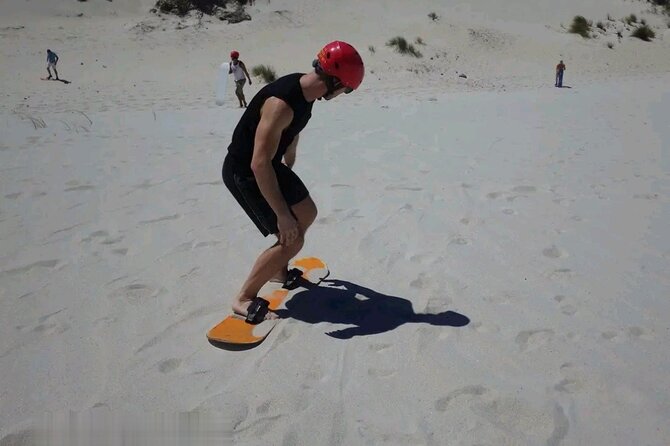 Explore Atlantis Sand Dunes with a 1hour 30mins sandboarding tour - Key points at a glance