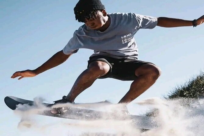 Explore Atlantis Sand Dunes with a 1hour 30mins sandboarding tour - Sitting or standing: choose your first run