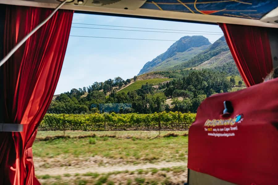 From Cape Town: 3 Regions Wine Tour with 3 Estates, 15 Wines - Crossing Helshoogte toward Franschhoek