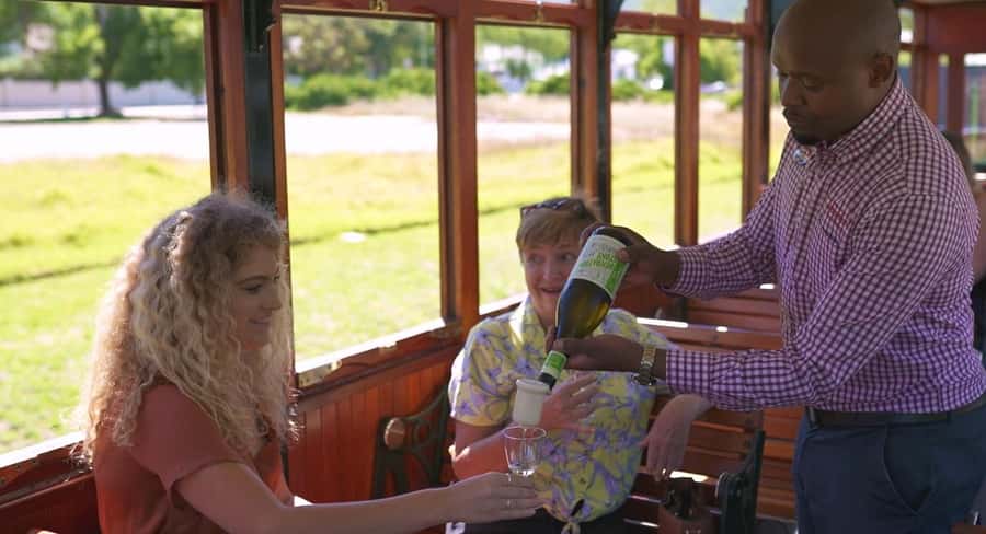 From Cape Town: Franschhoek Wine Tram Hop-on Hop-off - Boarding the tram and tram buses