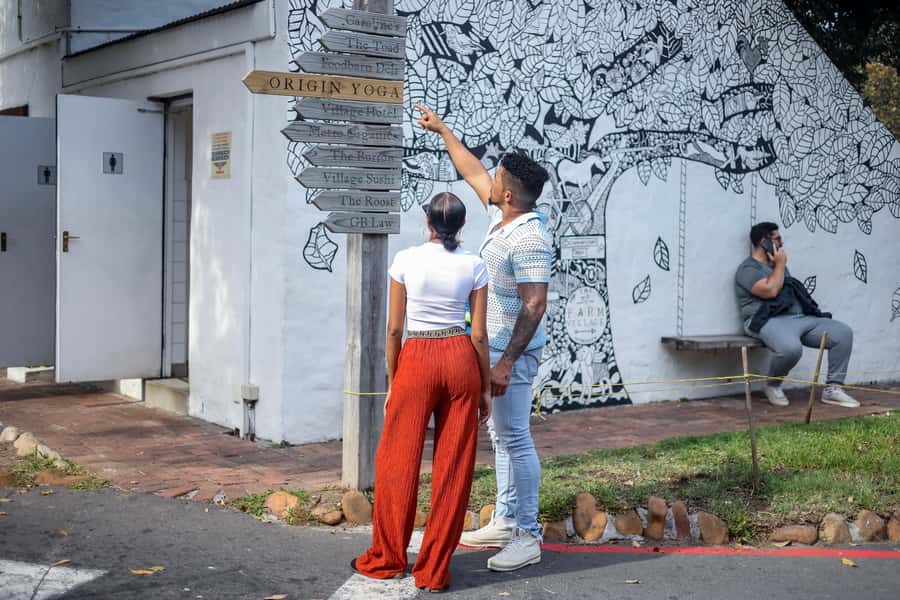 From Cape Town: Half-Day Boulders Beach and Penguins Tour - Muizenberg adds a final splash of color