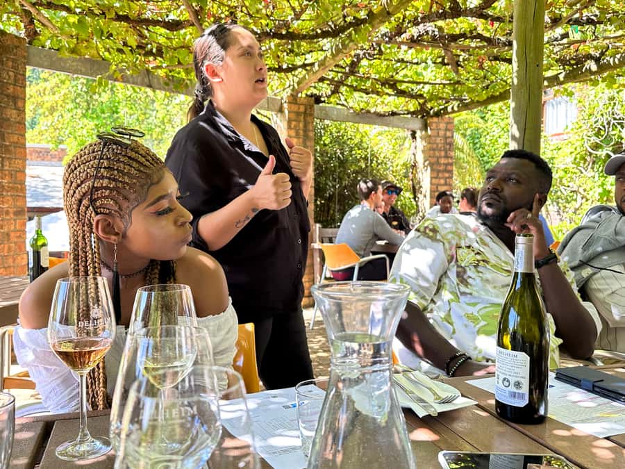 From Cape Town: Stellenbosch & Franschhoek Wine Tasting Tour - Delheim brings food, family character, and a longer pause