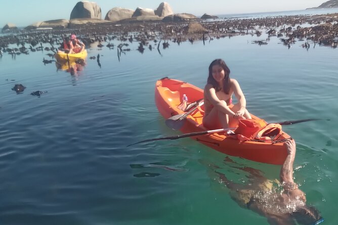 Kayak Adventure at Clifton Beach - Getting ready with a PFD and paddle lesson