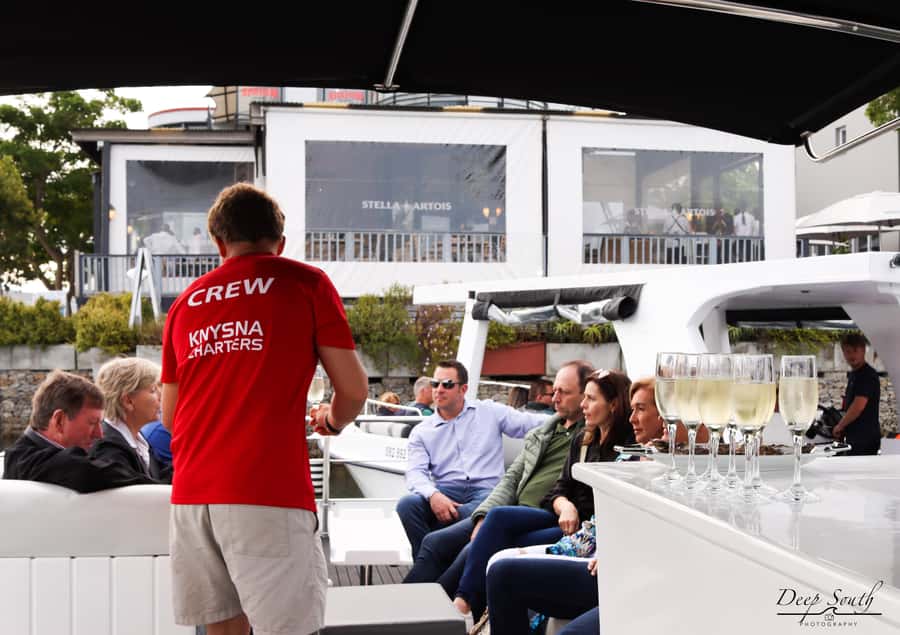 Knysna Lagoon: Boat Cruise with Oyster & White Wine Tasting - Crossing the blue waters of Knysna Lagoon