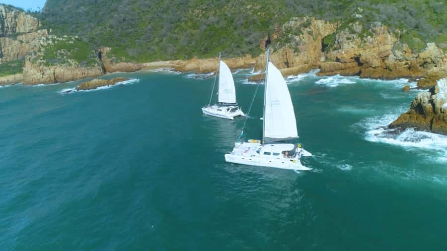 Knysna: Luxury Sunset Cruise with Captain's Barbeque - Sunset, blankets, and the ride home