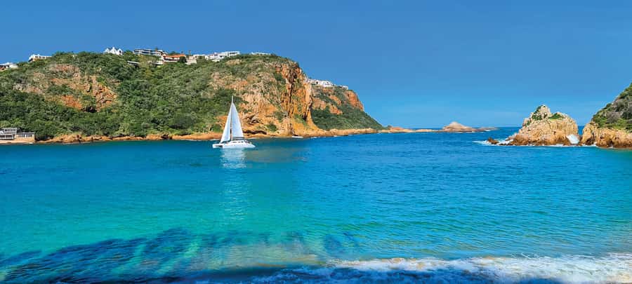 Knysna: Luxury Sunset Cruise with Captain's Barbeque - Following Knysna Lagoon toward the Heads