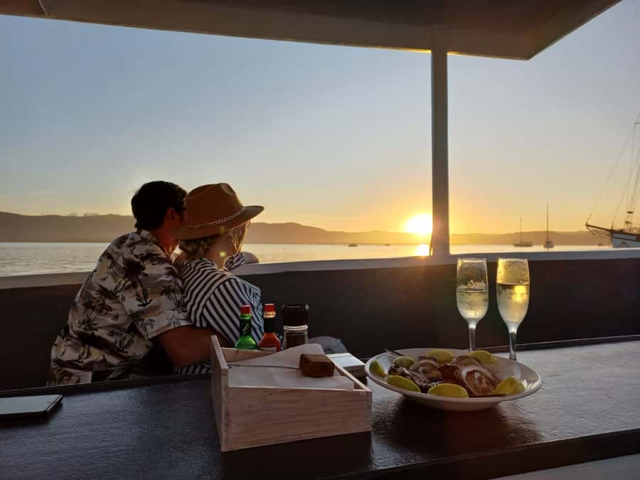 Knysna: Wine & Oyster Luxury Lounger Sunset Cruise - Wine, oysters, and the sunset hour