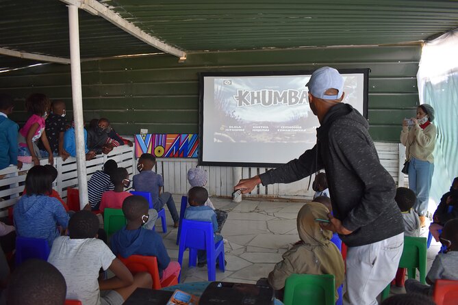 Pop-Up Cinema in the Community + Post Film Discussion with Locals - The short walk to the screening venue