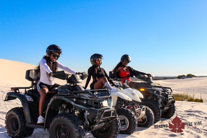 Quad bike in the Atlantis sand dunes Cape Town - Photo stops, guides, and the Table Mountain view