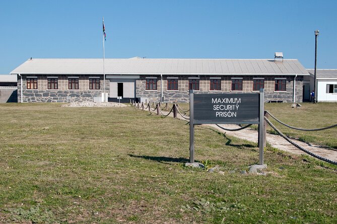 Robben Island Tour including Pick Up & Drop Off from Cape Town - Walking from the dock to the island tour buses