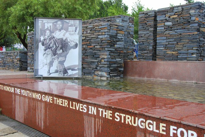 Soweto & Apartheid Museum Tour - Orlando Towers and Baragwanath Hospital from the road