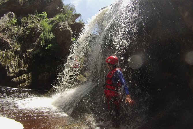Standard Canyoning Trip in The Crags, South Africa - The final 30-meter waterfall zipline