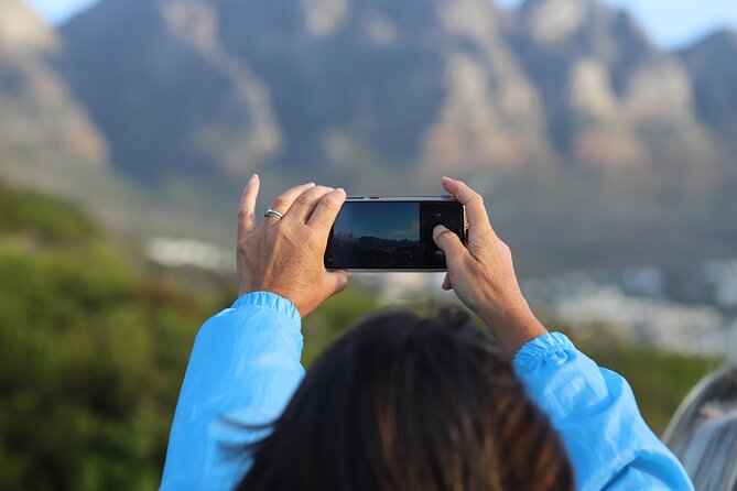 Summer Sunset Bus Tour in Cape Town - Passing Camps Bay on the way uphill