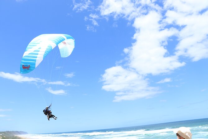 Tandem Paragliding Instructional Flights in Garden Route - Landing with a few more steps