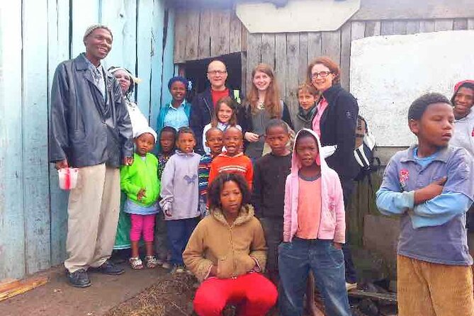 The Original Knysna Township Tour - Local shops, the Sanlam Center, and vetkoek